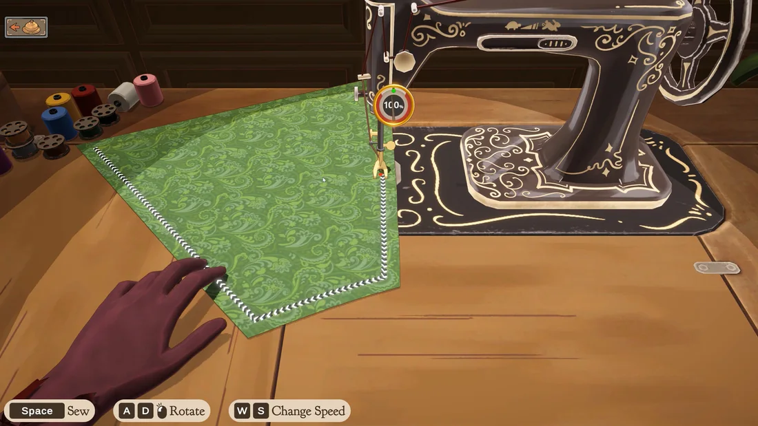 Fabric being fed through a sewing machine with the stitch prompts shown on screen